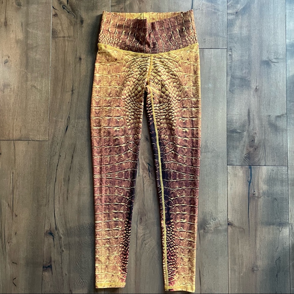 Niyama sol yellow snake skin leggings